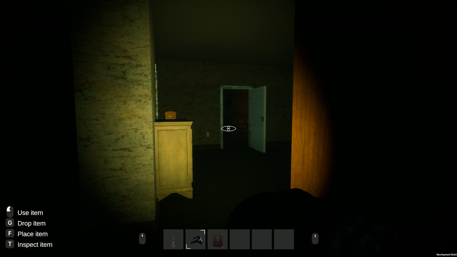 A flashlight sweeps a bare bedroom: a dresser, and a half-open door to a darker room beyond.