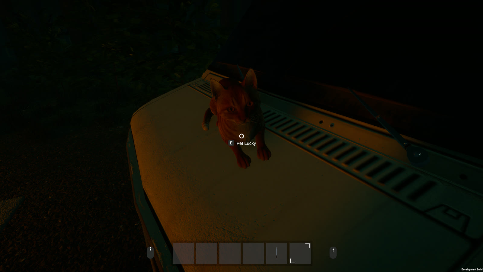 Lucky, an orange cat, sits on the hood of a car at night beside a “Pet Lucky” prompt.