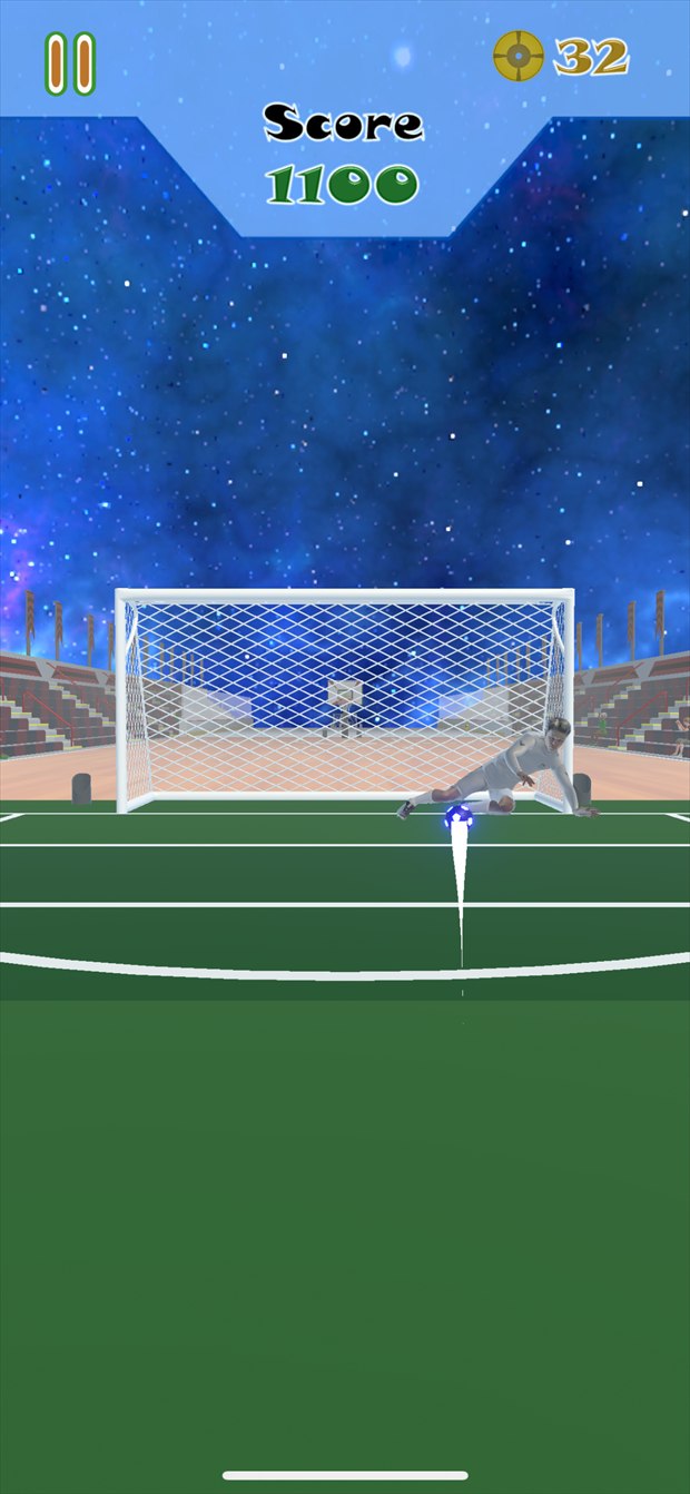 A soccer round: the keeper dives as a glowing ball is struck past him into the net. Score 1100.
